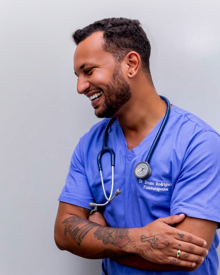 Dr. Marcus Webb wearing a stethoscope